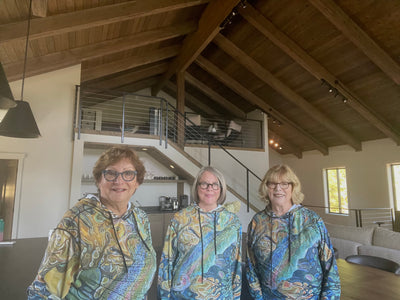Ladies wearing Magic Waters SunPro Hoodie